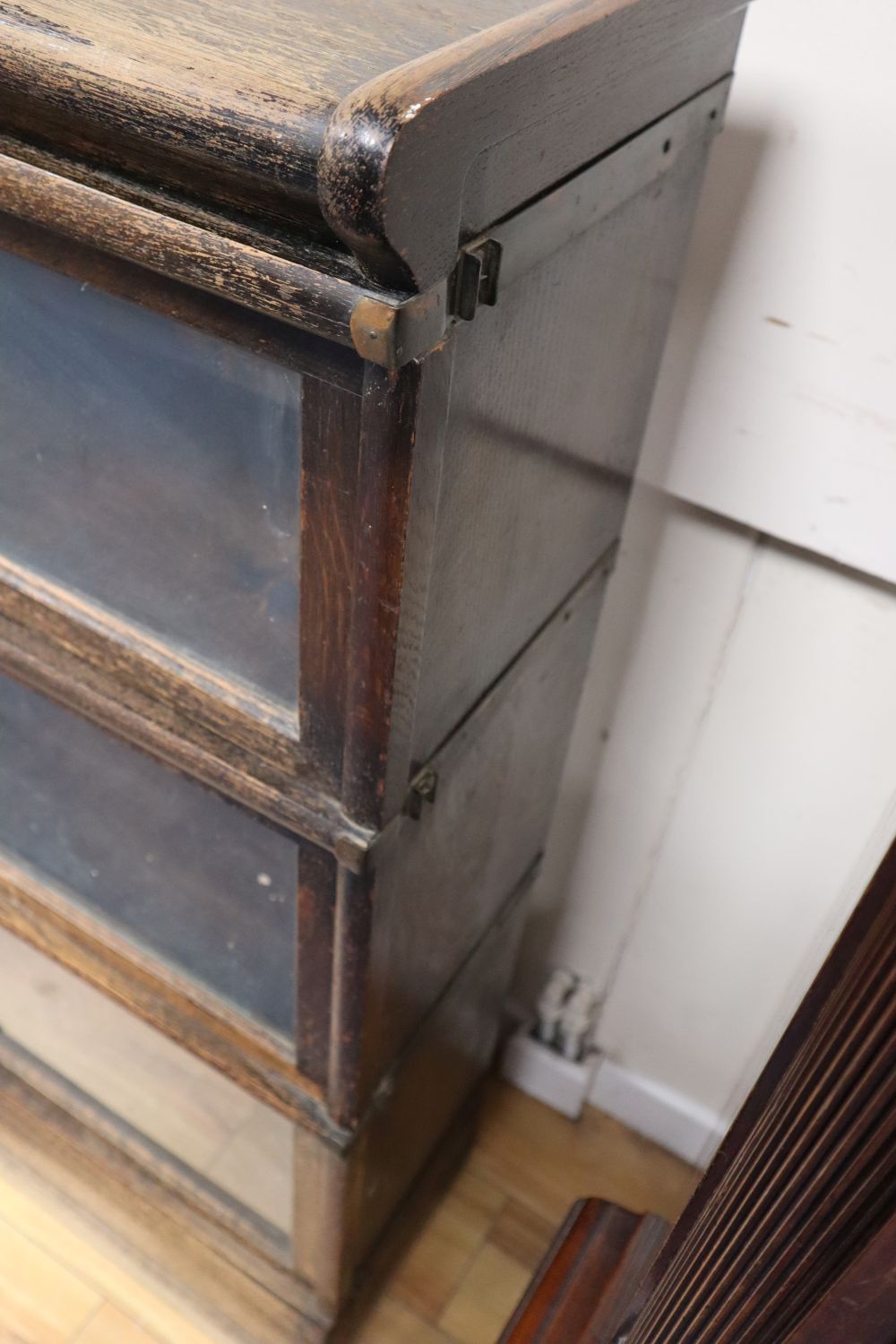 An oak Globe Wernicke three tier bookcase, width 87cm